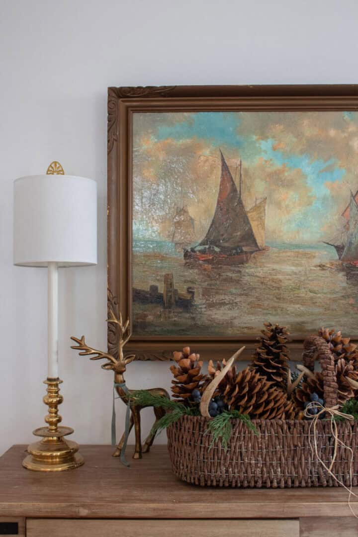 natural-rustic-Christmas-decorations - natural Christmas decor ideas, pinecones, antlers and pine clippings in an antique basket