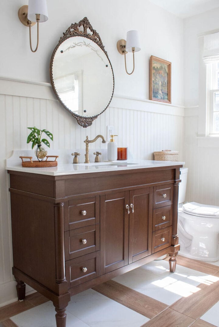 A-master-bathroom-ideas-wood-vanity-antique-mirror