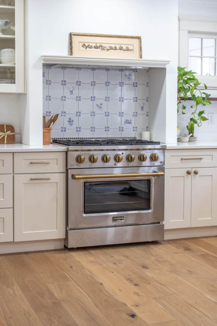 blue-and-white-tile-over-stove-custom-range-hood
