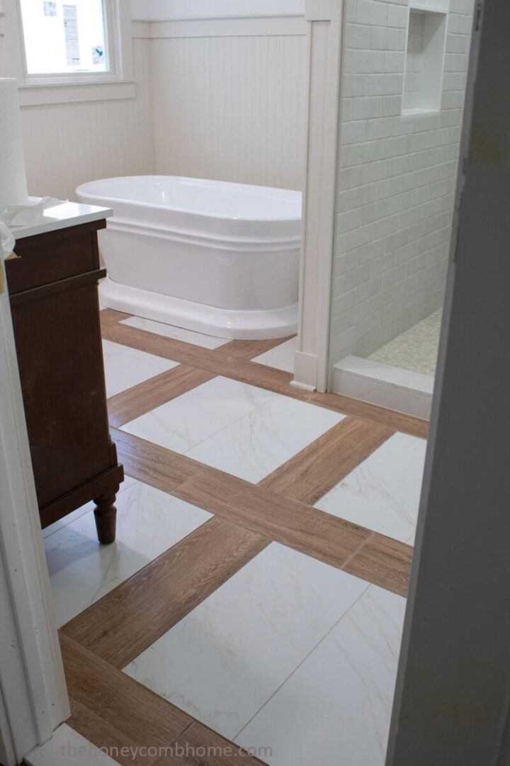 tile floor pattern, bathroom with inlay tiles, the honeycomb home blog